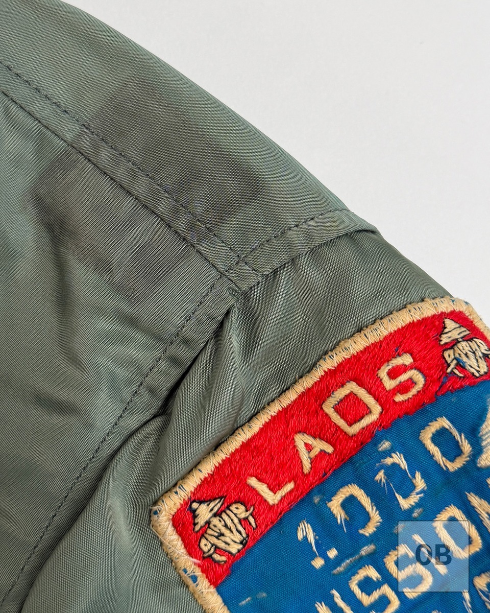 L-2B flight jacket shoulder shadows where officer rank insignia was removed sheep-dipped Raven FAC patch