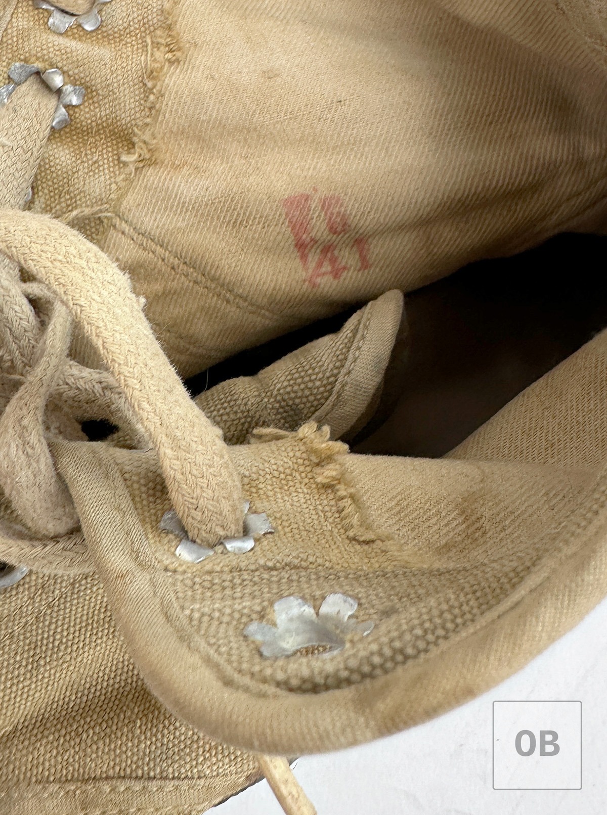 North Vietnamese jungle boots showing a second red ink factory marking on the inside sidewall.
