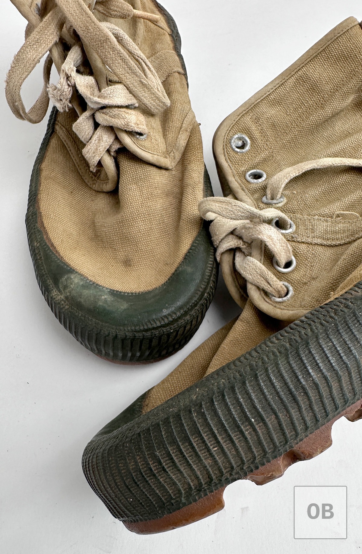 North Vietnamese jungle boots showing the molded rubber sidewall joined to the stitched canvas upper.