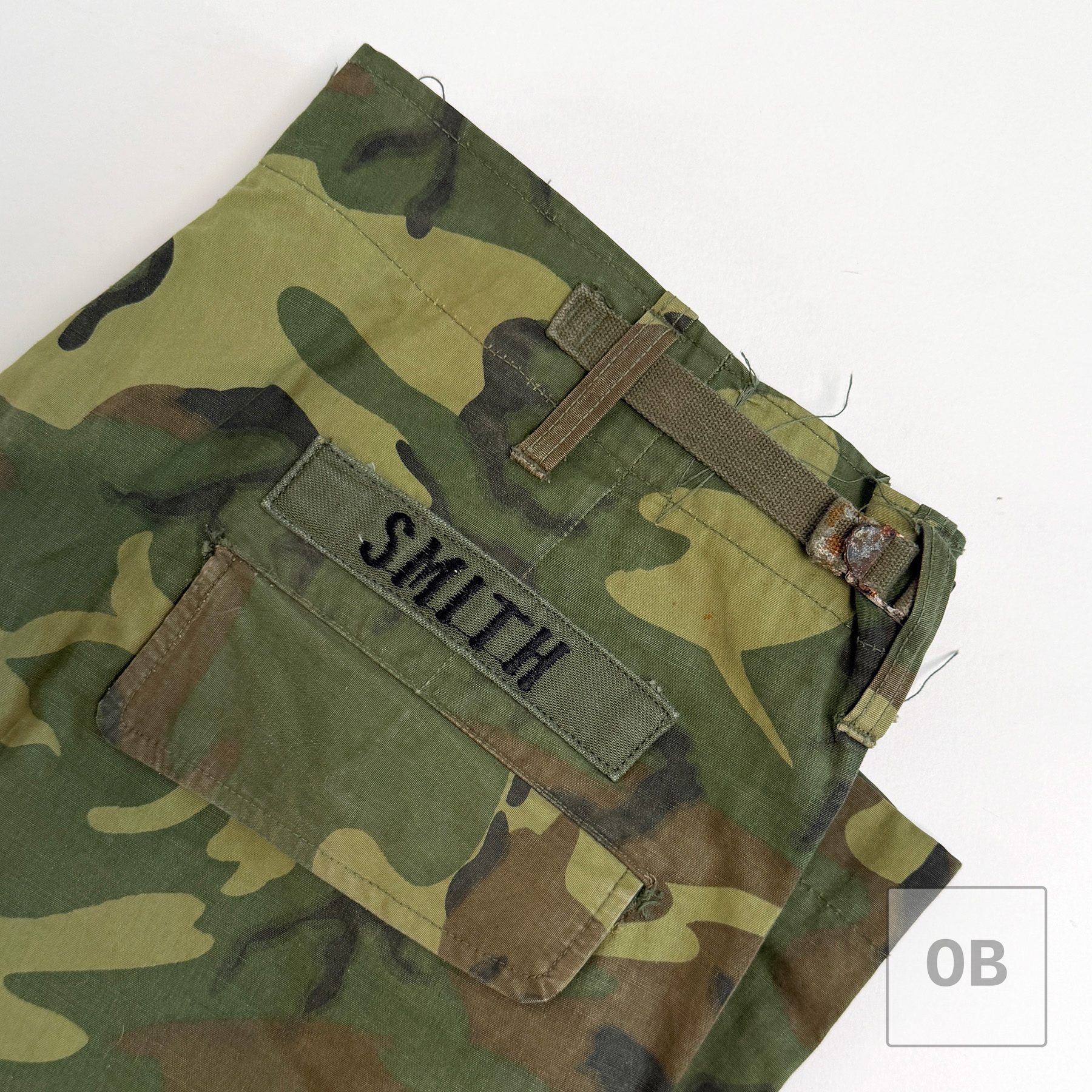 Vietnam War Navy SEAL Team 1 poplin ERDL camouflage jungle trousers, circa 1967, with a theater-made SMITH tape above the rear pocket.