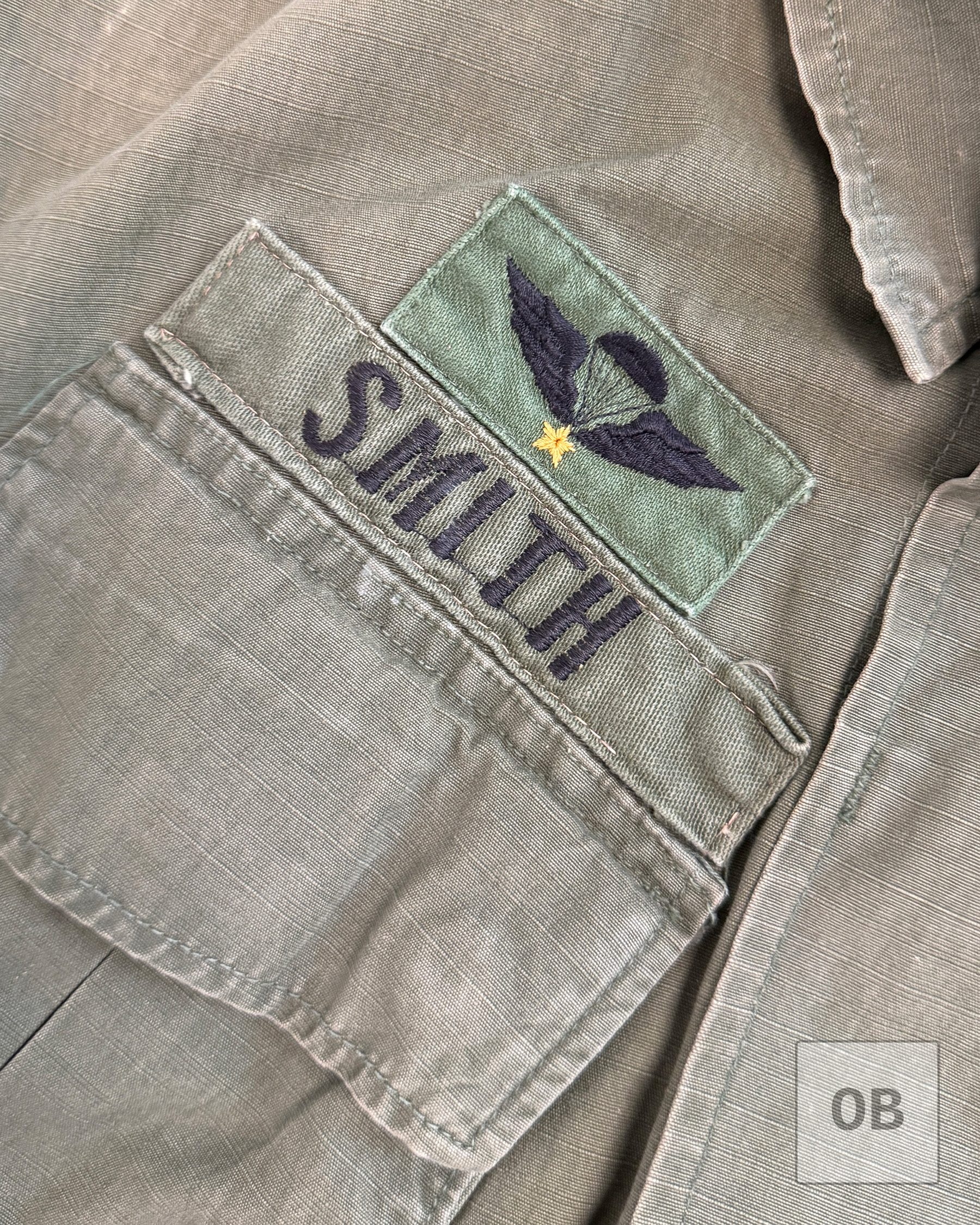Theater-made SMITH name tape and South Vietnamese jump wings on Navy SEAL Team 1 operator Gary R. Smith's Vietnam War OD jungle jacket.